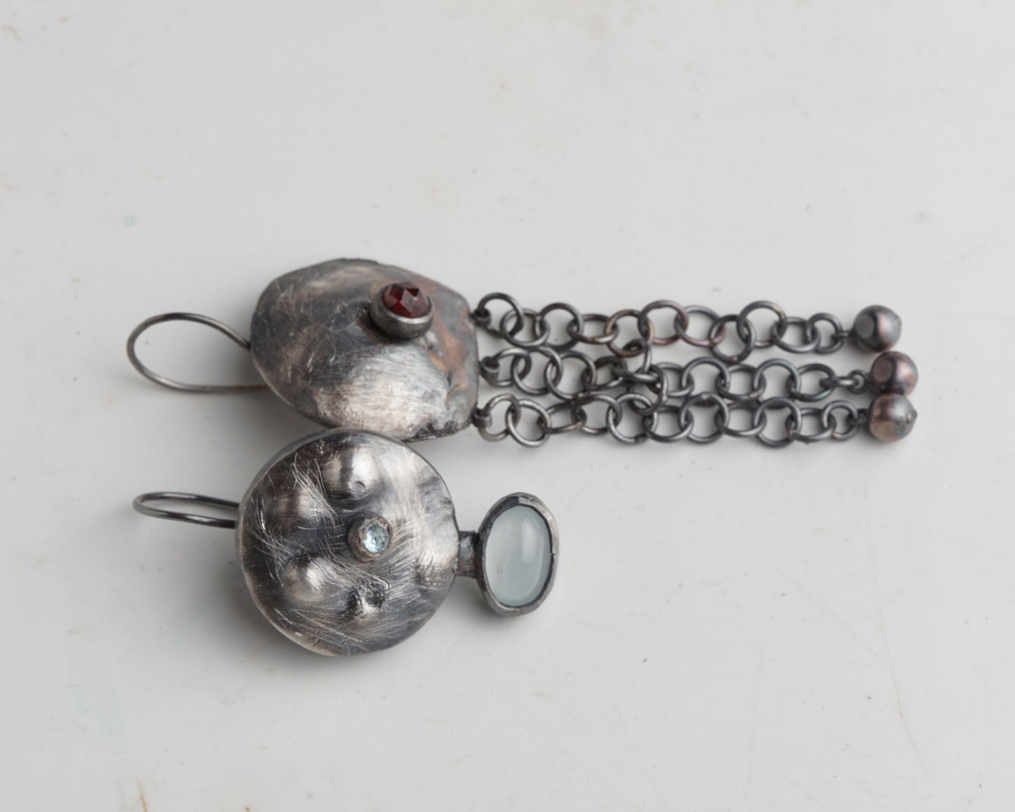 Archaic aquamarine and ruby earrings